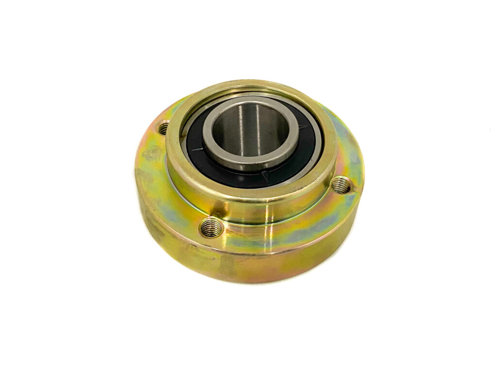 Flanged bearing housing with a colorful zinc finish and bolt holes visible in the flange, shown from above.