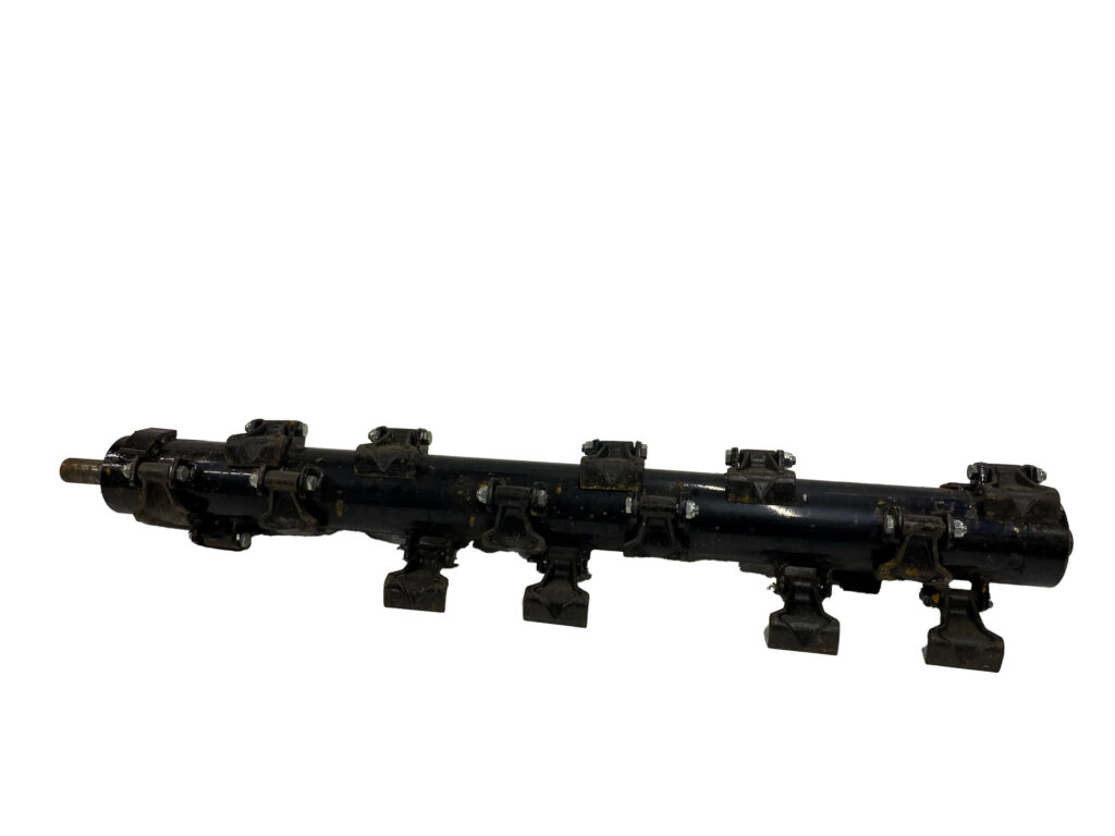 Section of black industrial pipe with multiple clamps and feet resting on a white background.