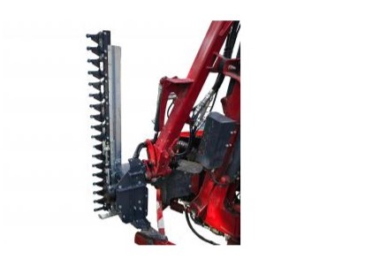 Red farming implement with a vertical spike harrow attached to a tractor hitch, used for soil breaking and aeration